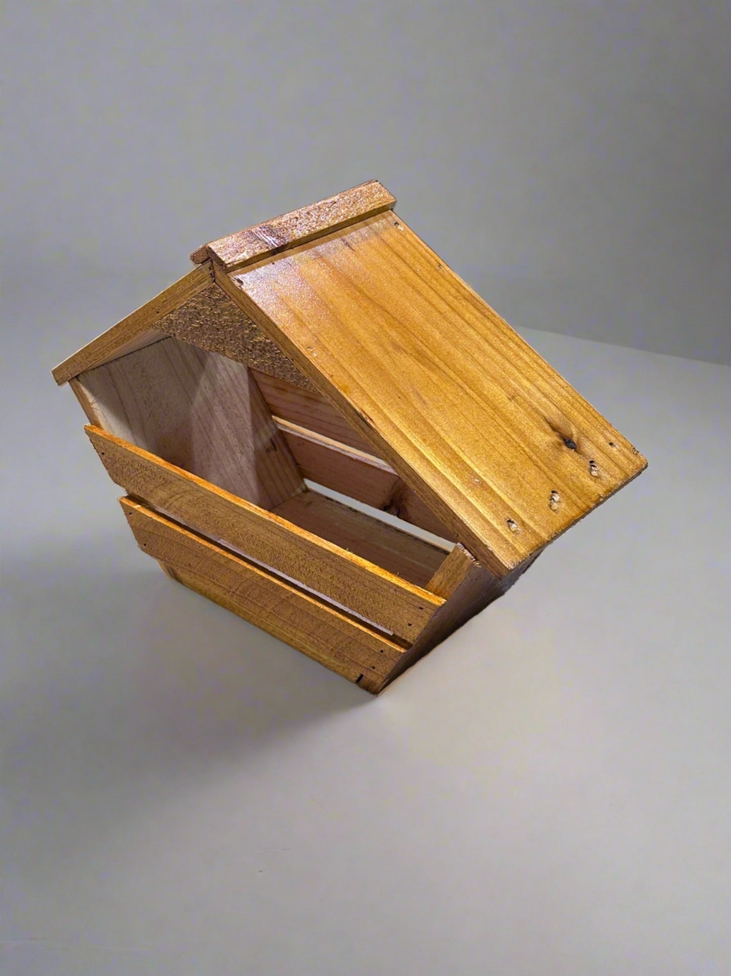 Dove Nesting Boxes are hand crafted using Southern Pine Designed for smaller sized doves yet many other species of birds will also use for nesting. Easy clean out without having to remove or adjust parts.
