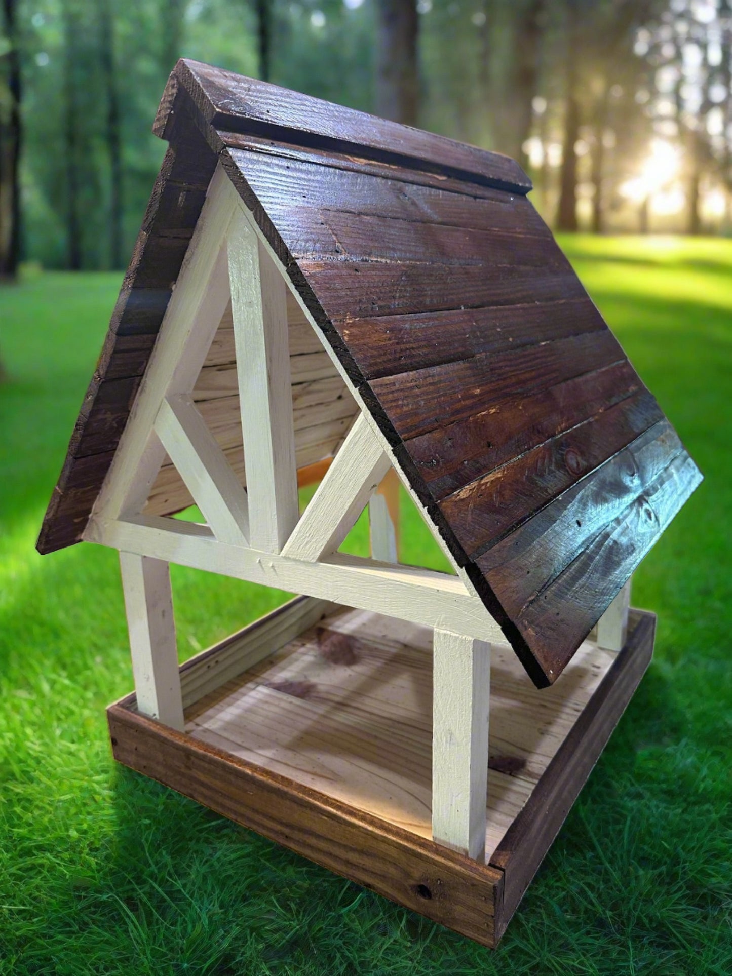  Enjoy attracting birds, squirrels, and other wildlife with this lovely Alpine Deluxe Fly Thru Bird Feeder. Fill up the tray with seed mixes and watch the birds, squirrels, chipmunks, and other wildlife show up to feast! This unique Wildlife Feeder is made with durable pine in a timber-style frame! The eaves extend an inch and a half past the outside edge of the feeder tray, helping to deflect rainwater.