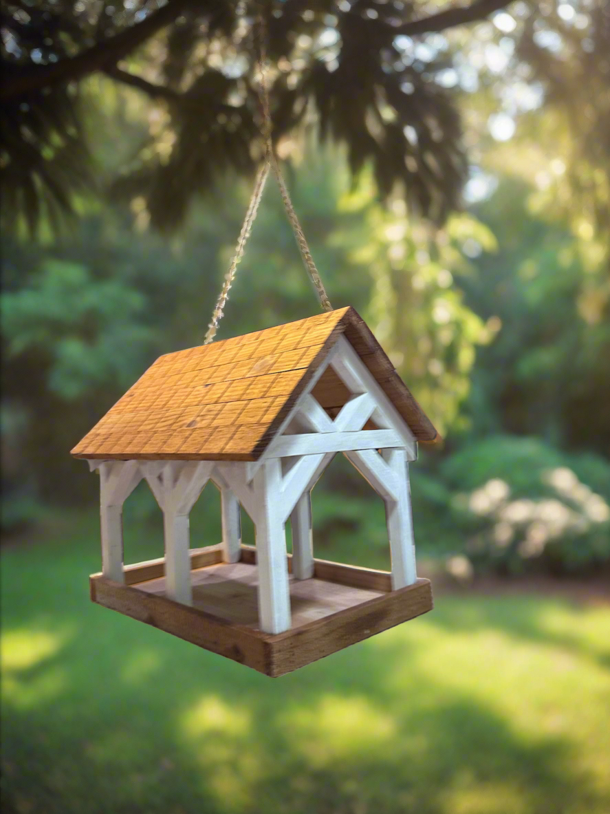 Deluxe Timber Frame Fly Thru Bird Feeder, Columns and Frame stained white with Faux Cedar Shake Rook Stained Honey Teak.