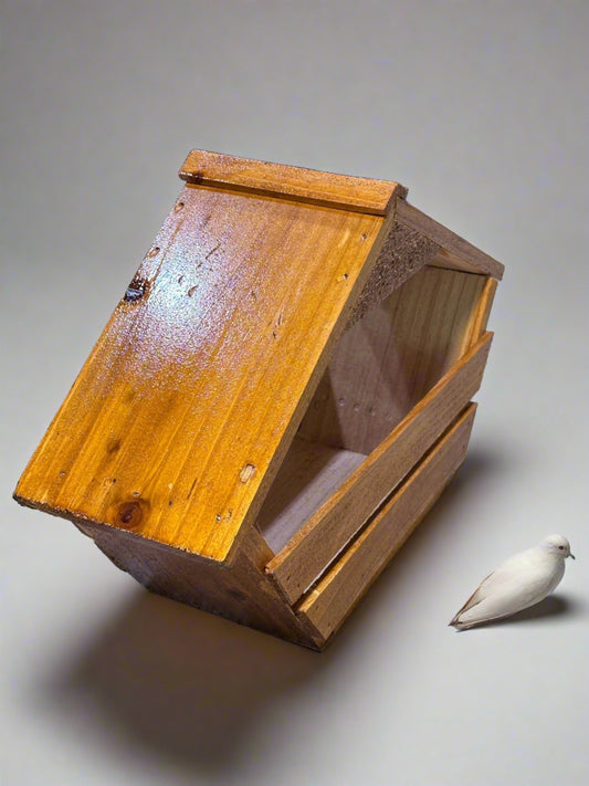 Dove Nesting Boxes are hand crafted using Southern Pine Designed for smaller sized doves yet many other species of birds will also use for nesting. Easy clean out without having to remove or adjust parts.