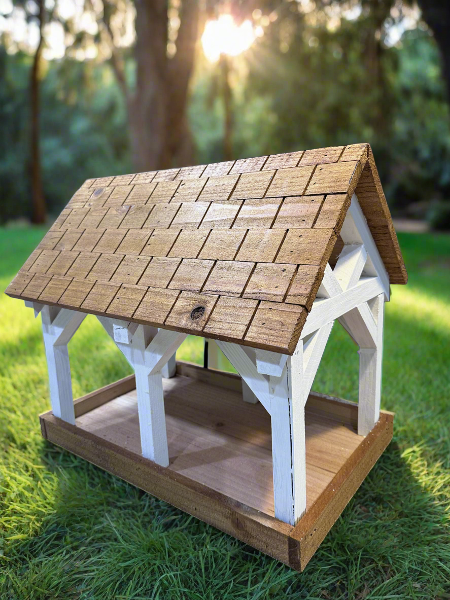 Deluxe Timber Frame Fly Thru Bird Feeder, Columns and Frame stained white with Faux Cedar Shake Rook Stained Honey Teak.