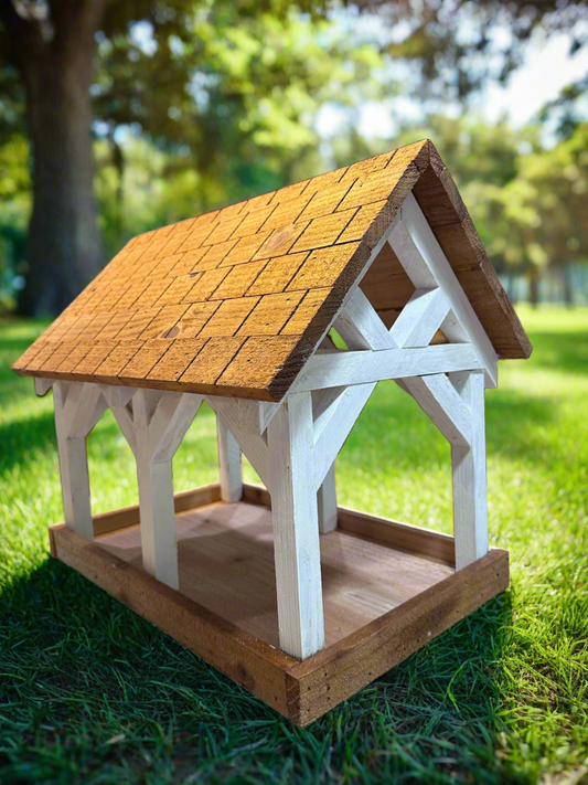 Deluxe Timber Frame Fly Thru Bird Feeder, Columns and Frame stained white with Faux Cedar Shake Rook Stained Honey Teak. 